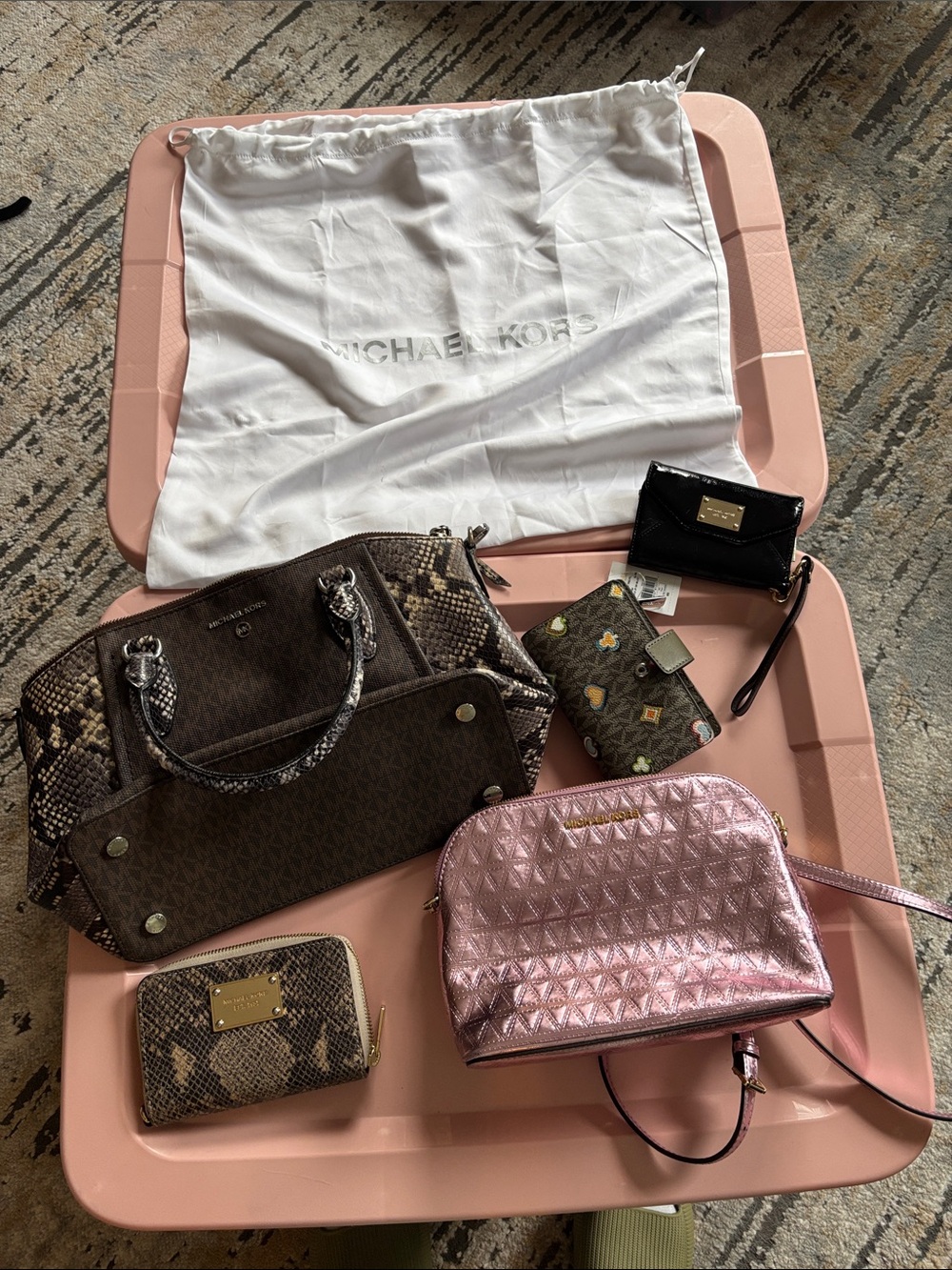 Michael Kors bundle two bags, three wallets and a dust bag
